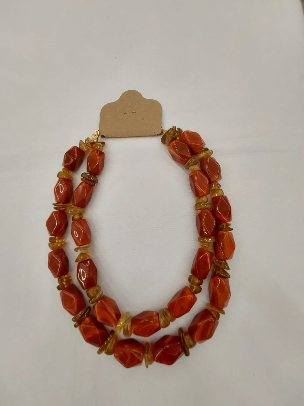 Peça de bijuteria artesanal Dau